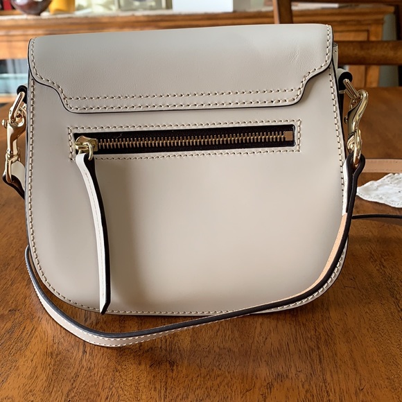 EUC Dooney and Bourke cream Leather Crossbody fold over satchel. Zip on back. - Picture 3 of 8